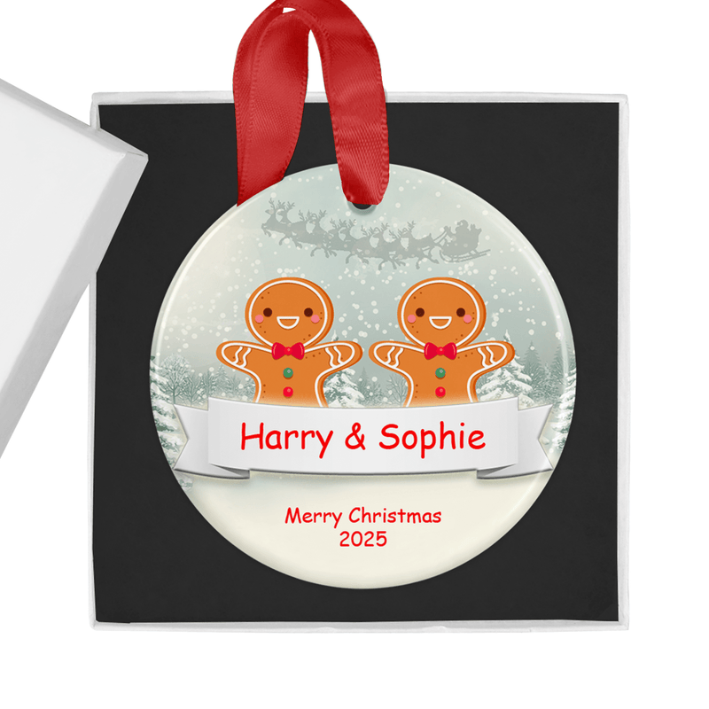 Personalised ceramic ornament with a cheerful gingerbread couple design