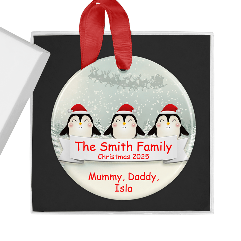 Personalised ceramic ornament with a festive penguin family design