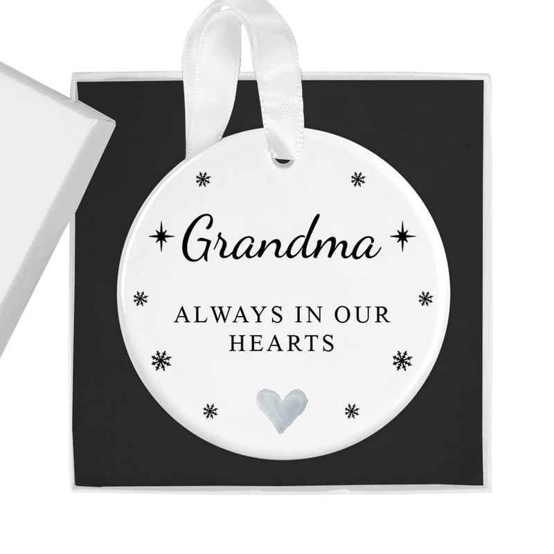 ceramic ornament with the "Always in Our Hearts" message with stars and a central heart motif