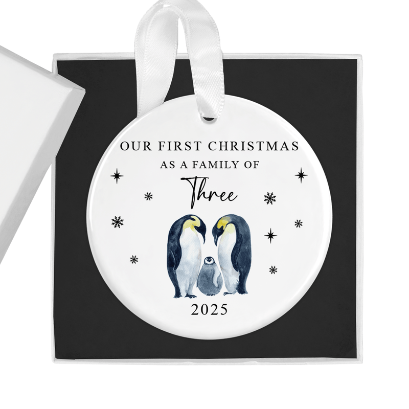 ceramic ornament with a sweet penguin family illustration