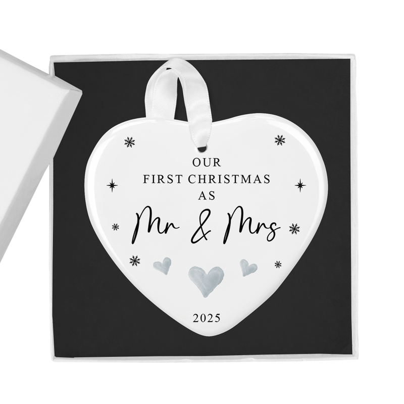 ceramic ornament with a classic black lettering with heart and snowflake accents for a festive yet modern look