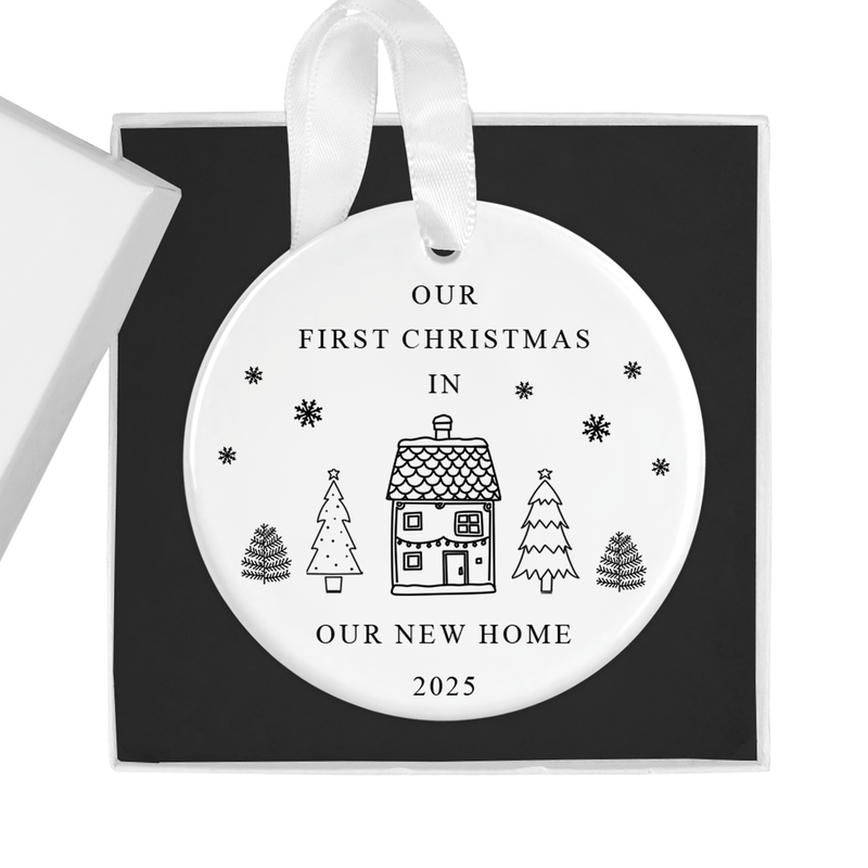 ceramic ornament with a sweet illustrated house and Christmas trees with delicate snowflake accents