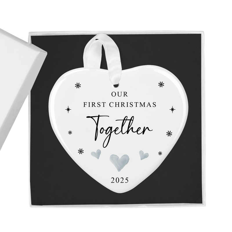 ceramic ornament with an elegant lettering with subtle snowflake and heart accents for a classic festive look