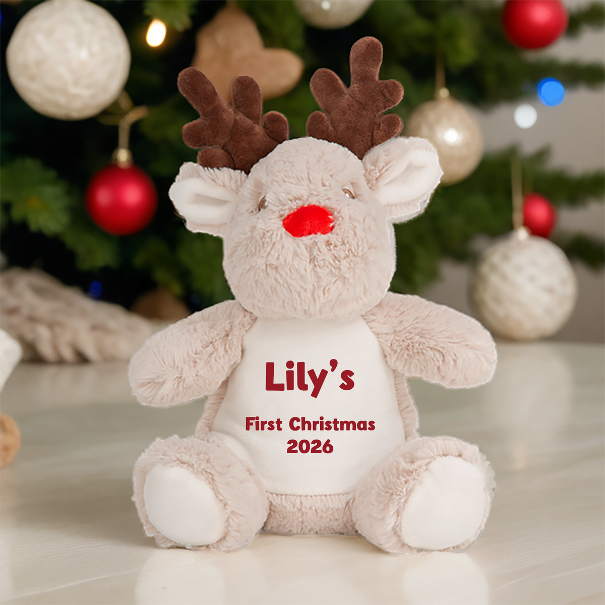 Personalised 1st Christmas Name Reindeer Soft Toy showing red First Christmas reindeer