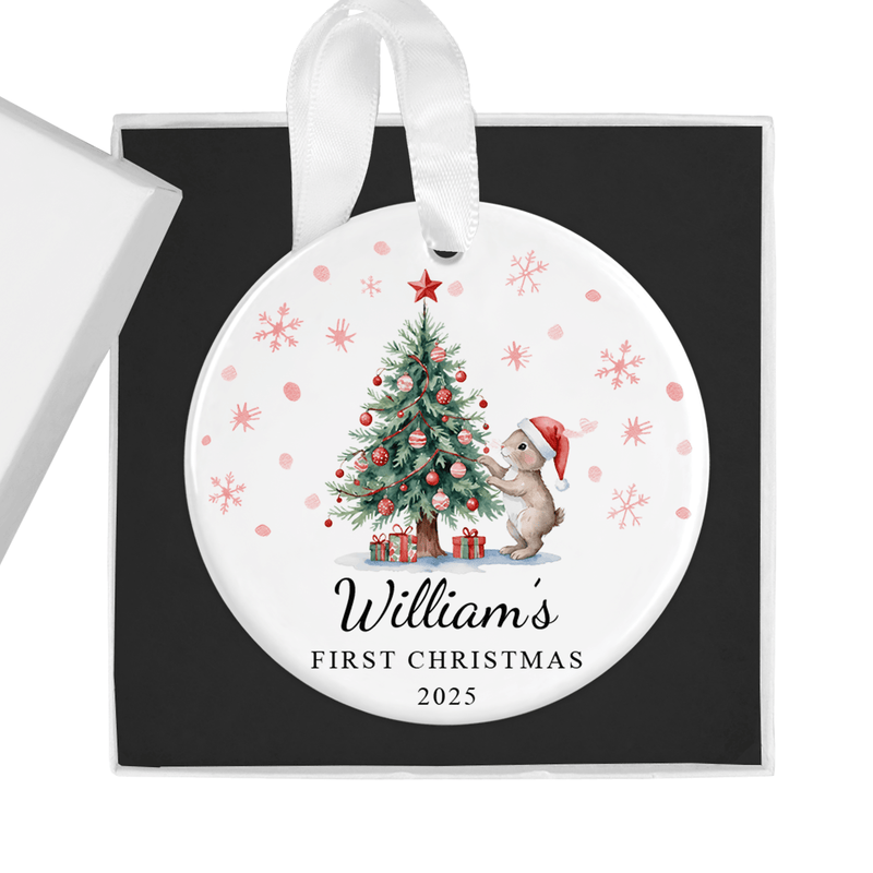 Personalised ceramic ornament with an adorable bunny in a Santa hat gazing at