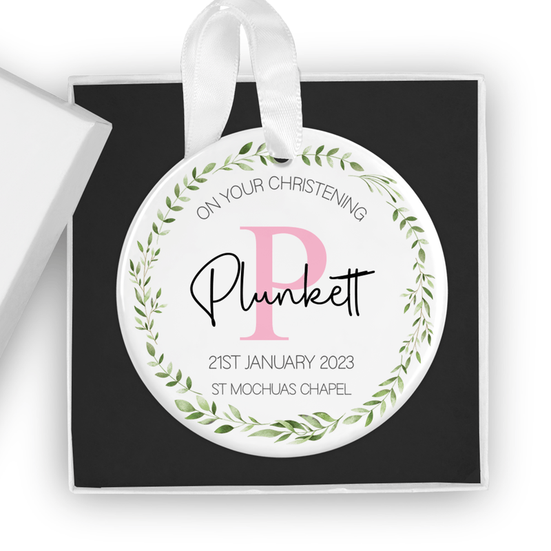 Personalised ceramic ornament with a delicate green leaf wreath design with a soft pink initial and elegant typography