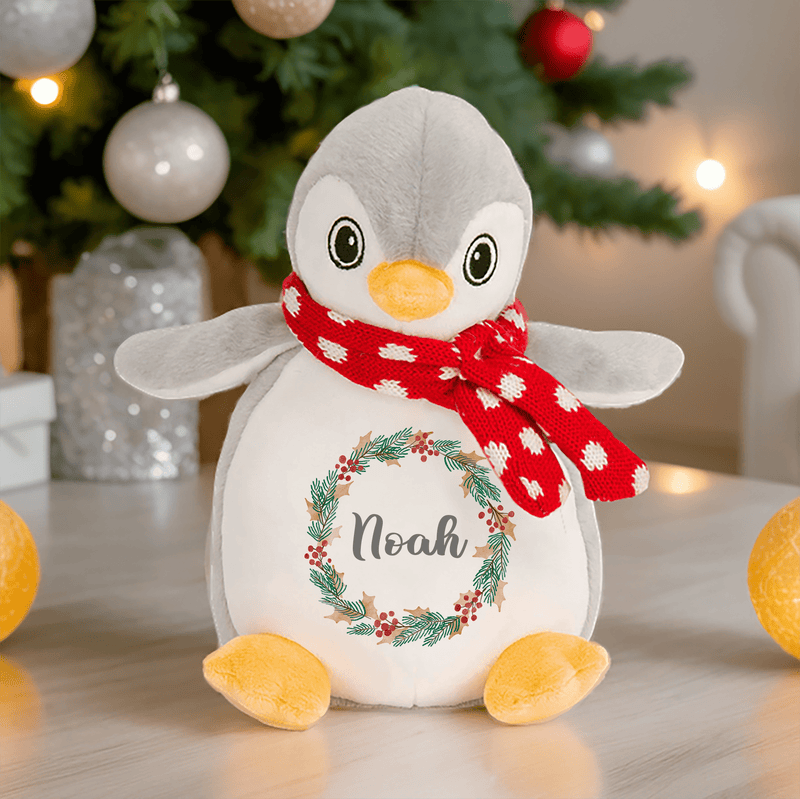 Personalised 1st Christmas Penguin Soft Toy with Wreath showing wreath