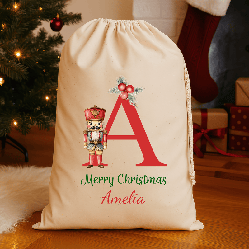 Personalised natural Christmas sack with nutcracker design and name and initial