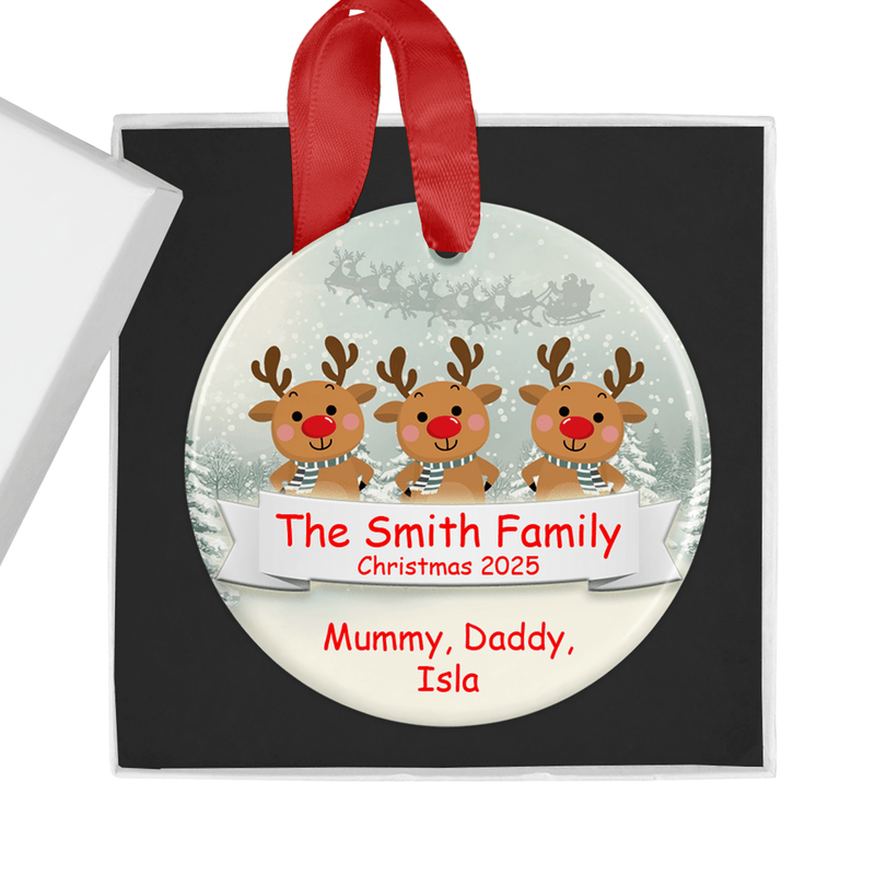 Personalised ceramic ornament with a cheerful reindeer family design