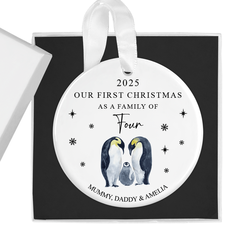 Personalised ceramic ornament with two loving parent penguins with their two chicks