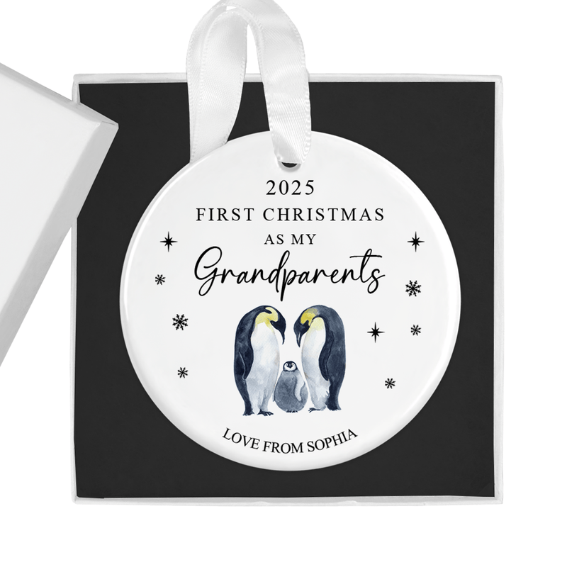 Personalised ceramic ornament with two grandparent penguins watching over their adorable chick