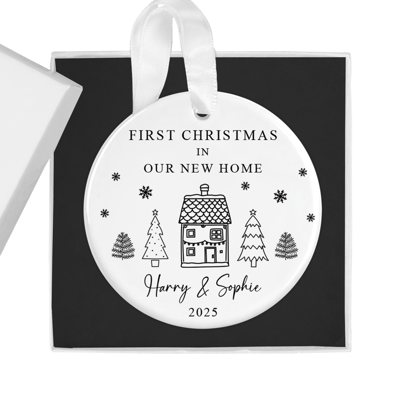 Personalised ceramic ornament with a first christmas new home artwork