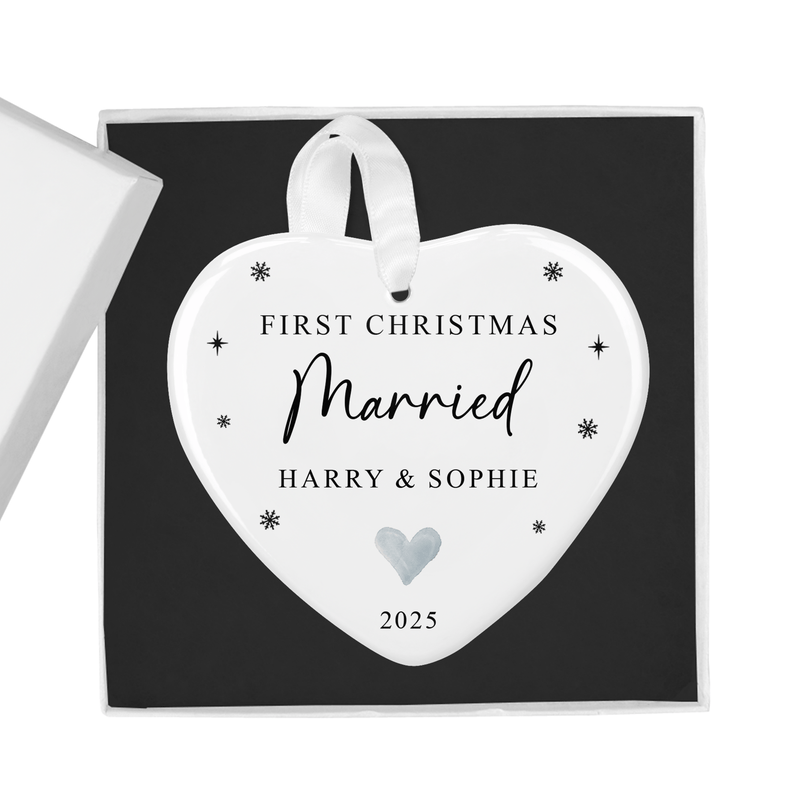 Personalised ceramic ornament with a heart-shaped ornament with delicate snowflake accents and soft grey hearts