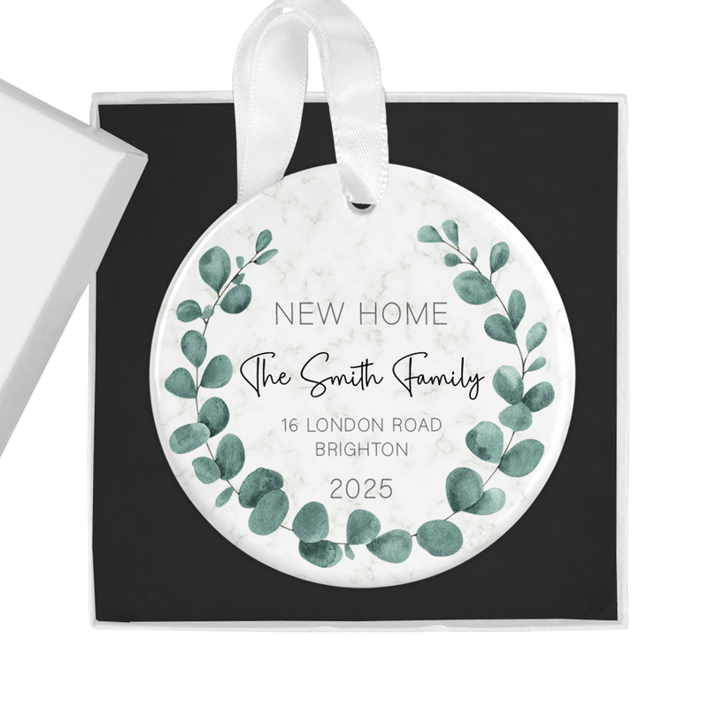 Personalised ceramic ornament with a soft eucalyptus leaf design with delicate typography