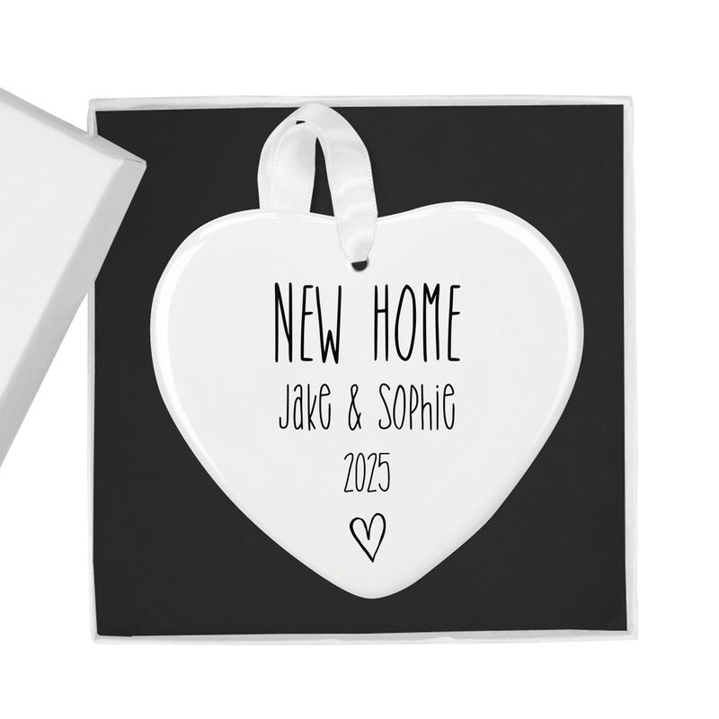 Personalised ceramic ornament with a minimalist design with elegant black typography and a hand-drawn heart motif