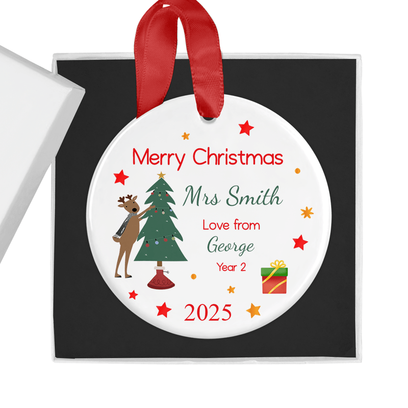 Personalised ceramic ornament with a festive reindeer and Christmas tree design