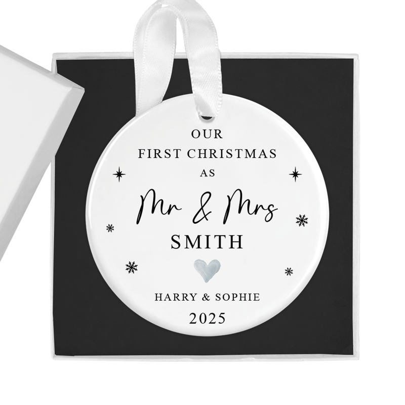 Personalised ceramic ornament with a delicate heart and snowflake accents
