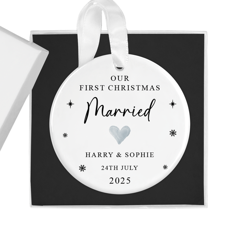 Personalised ceramic ornament with a first christmas married ornament with date artwork
