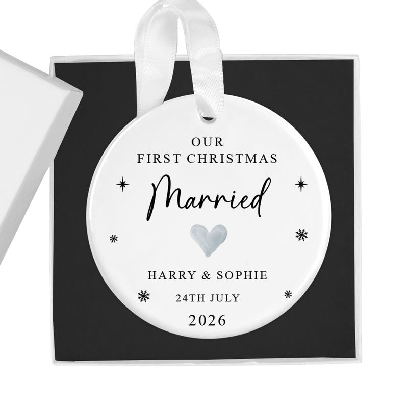 Personalised ceramic ornament with a first christmas married ornament with date artwork