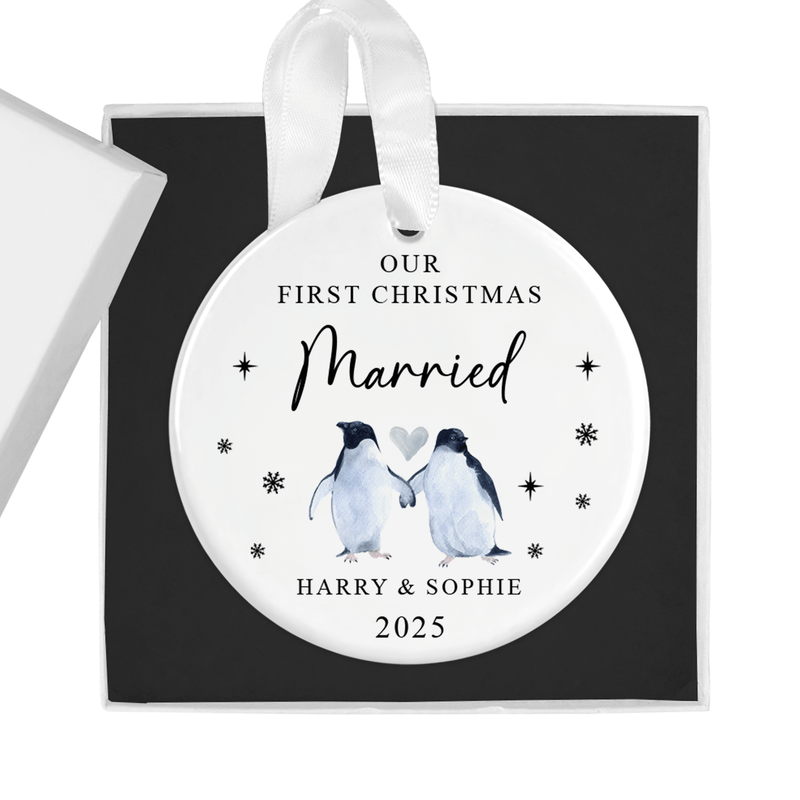 Personalised ceramic ornament with two adorable penguins holding flippers with a heart above