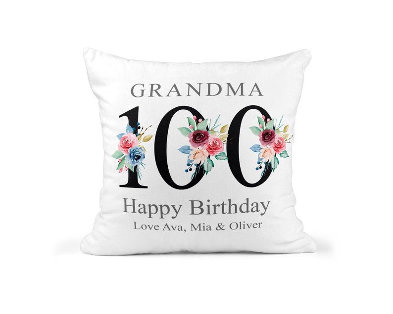 Personalised Black Floral 100th Birthday Cushion showing a floral milestone design front view