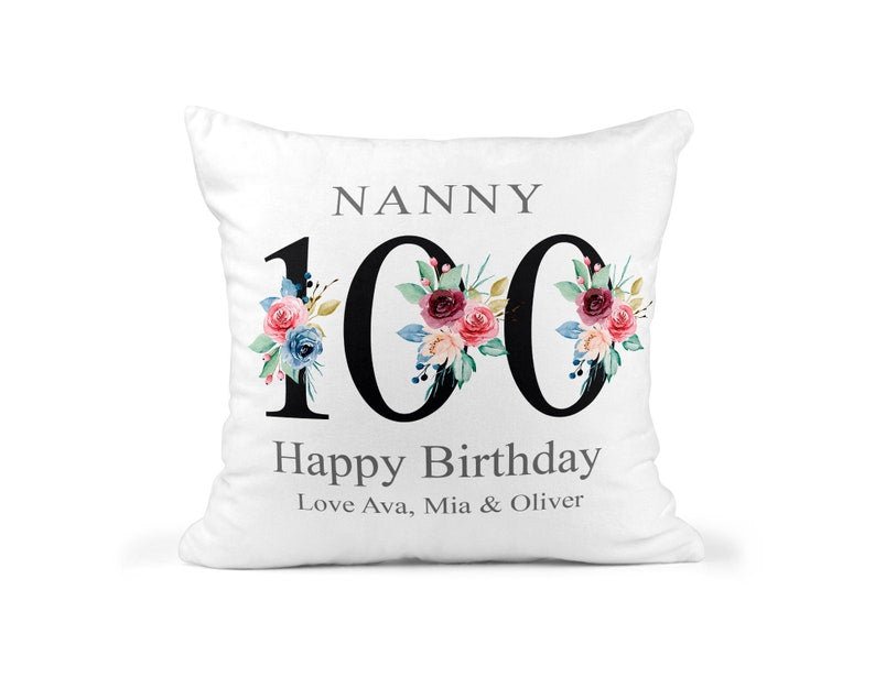 Personalised Black Floral 100th Birthday Cushion showing a floral milestone design front view