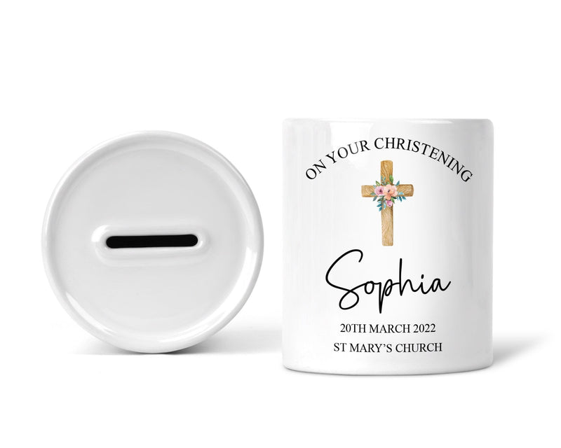 Personalised Cross Christening Money Box shown as a ceramic keepsake