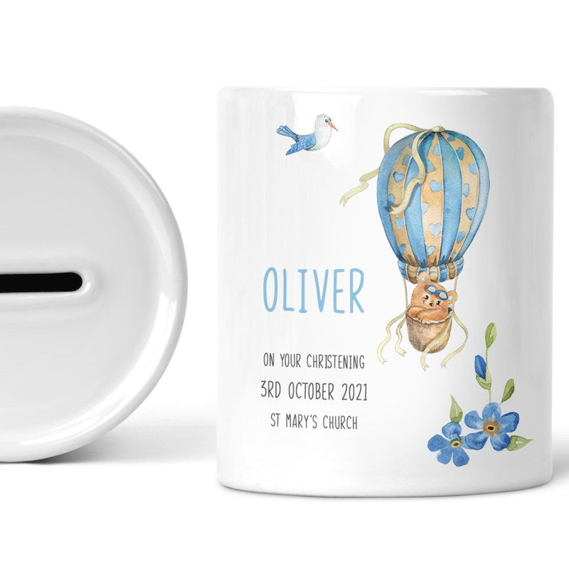 Personalised Blue Balloon Christening Money Box shown as a ceramic keepsake