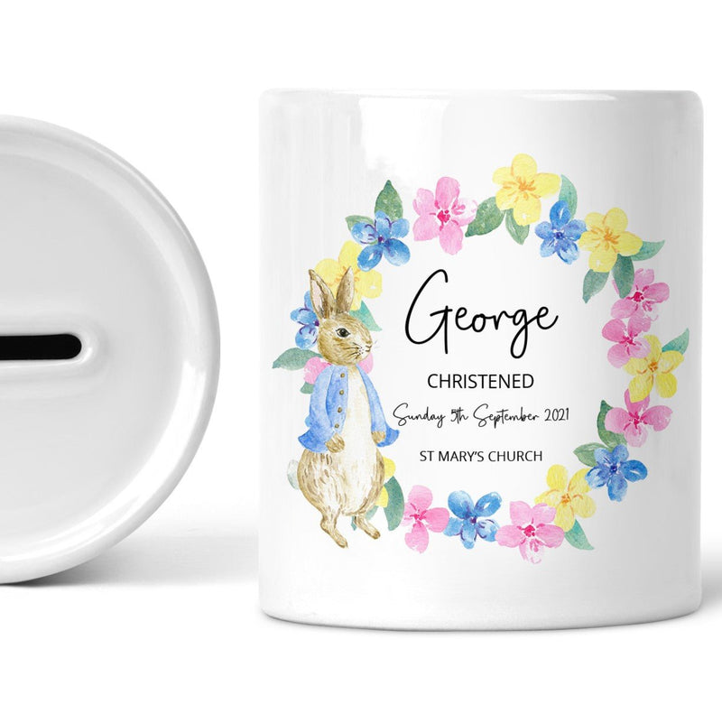 Personalised Blue Rabbit Christening Money Box shown as a ceramic keepsake