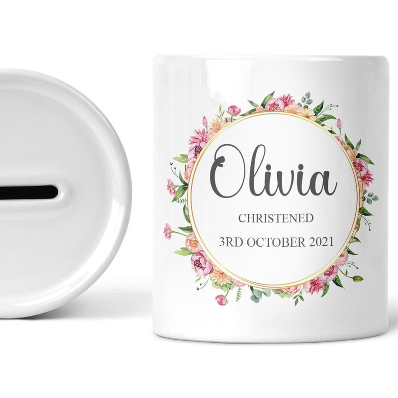 Personalised Gold Floral Christening Money Box shown as a ceramic keepsake