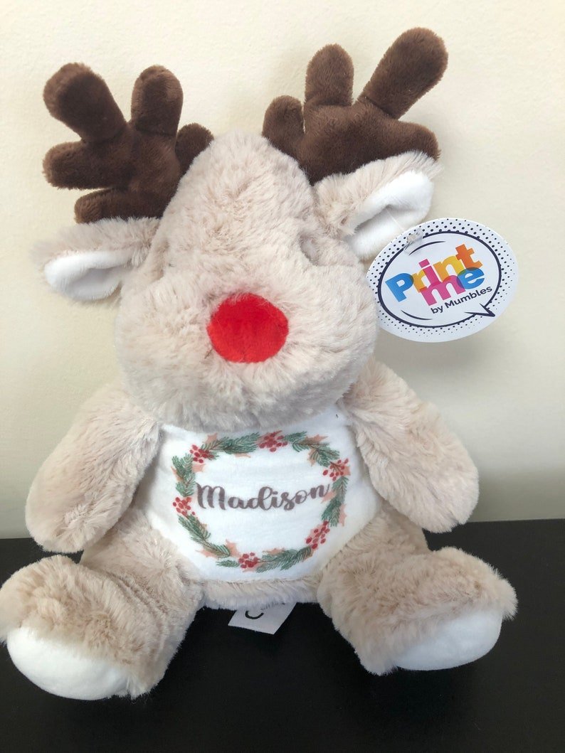 Personalised 1st Christmas Red Reindeer Soft Toy with Wreath showing wreath