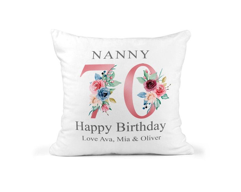 Personalised Nanny 70th Birthday Cushion with Names showing a floral milestone design front view