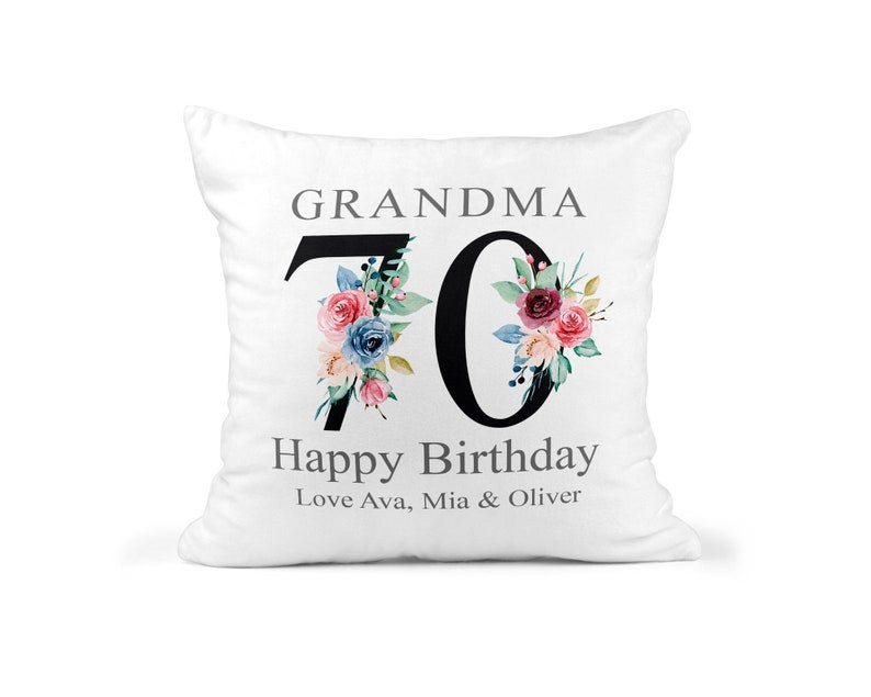 Personalised Nanny 70th Birthday Cushion with Names showing a floral milestone design front view