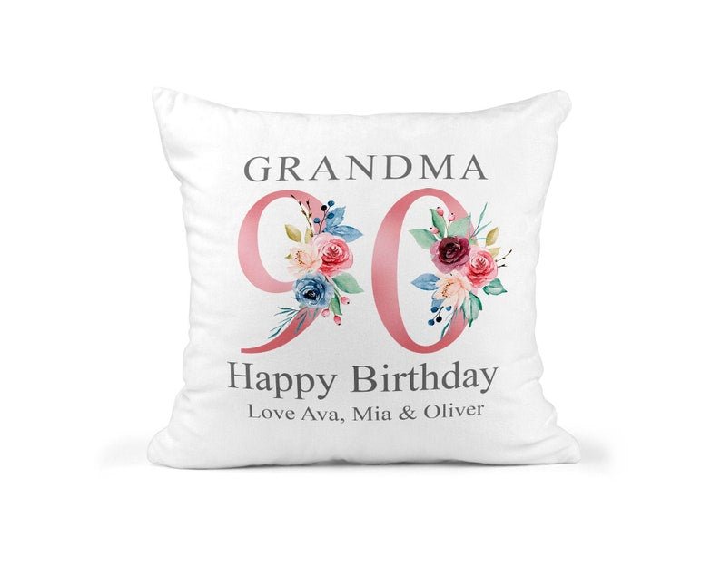 Personalised Nanny 90th Birthday Cushion with Names showing a floral milestone design front view