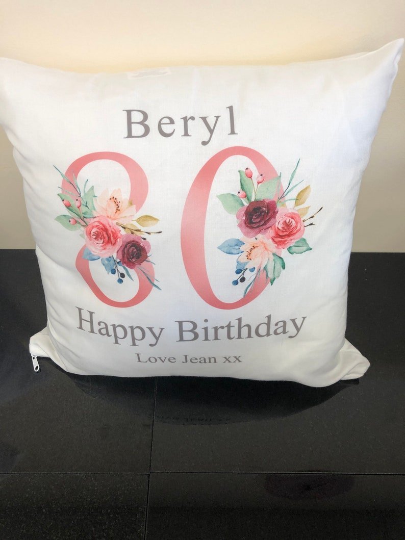 Personalised Grandma 80th Birthday Cushion with Names showing a floral milestone design detail view