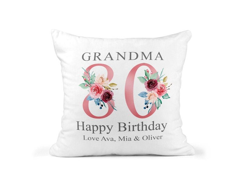 Personalised Grandma 80th Birthday Cushion with Names showing a floral milestone design front view