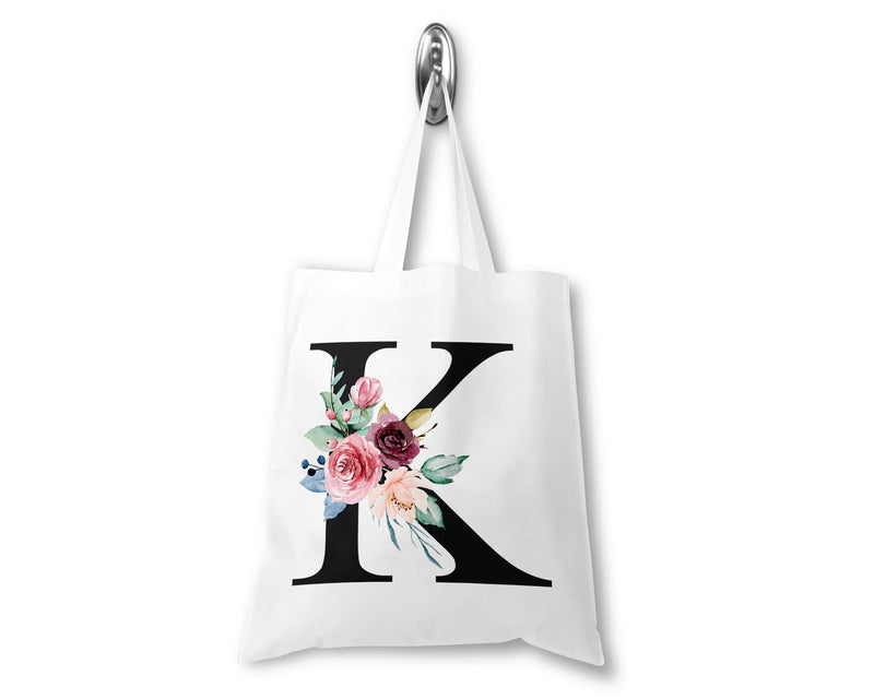 Personalised tote bag showing floral letter initial detail