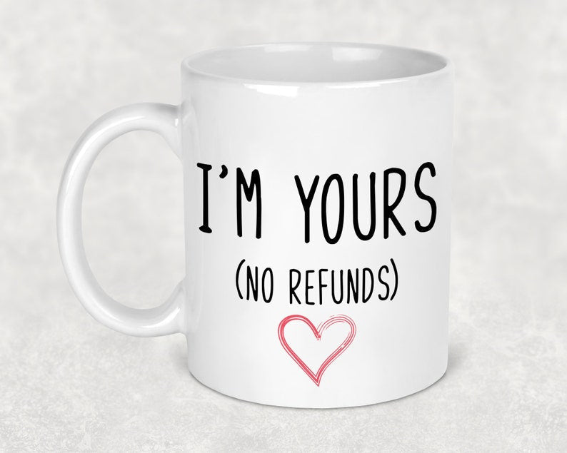 Valentine's Day I'm Yours No Refunds Mug shown with printed design