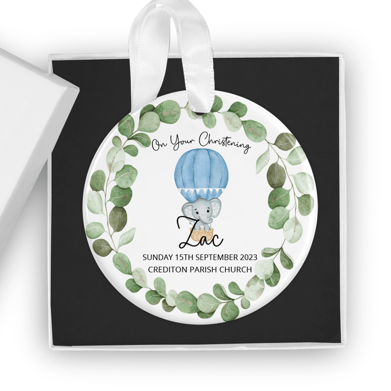 Personalised ceramic ornament with a charming blue hot air balloon and elephant design