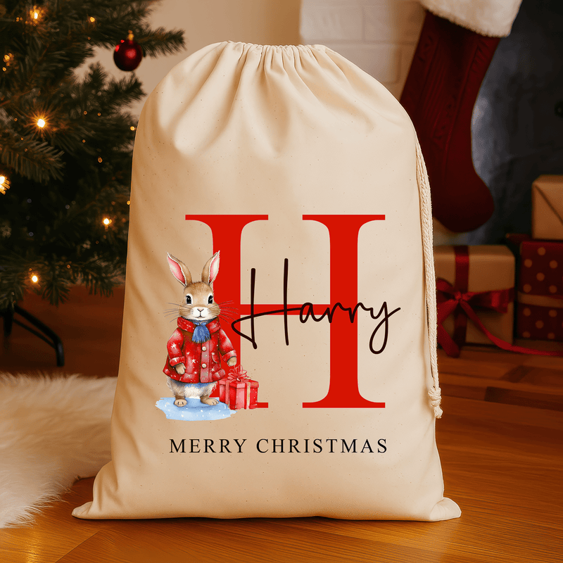 Personalised natural Christmas sack with red rabbit design and name and initial