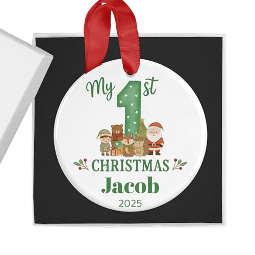 Personalised green first Christmas ceramic bauble with woodland design.