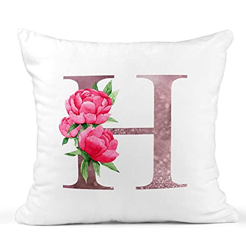 Personalised pink floral initial cushion with white background.