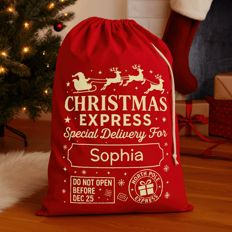 Personalised red Christmas sack with North Pole Express design and printed name