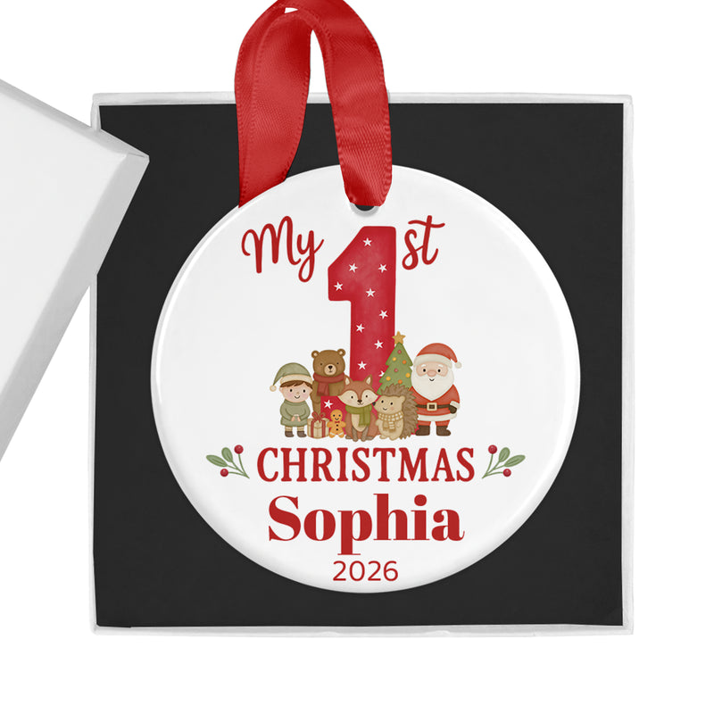 Personalised red first Christmas ceramic bauble with woodland design.